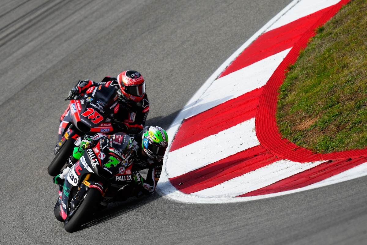 Belgium's rider Barry Baltus takes a curve ahead of Spain's rider Manuel Gonzalez during the Moto2 race of the Portugal Motorcycle Grand Prix, at the Algarve International circuit near Portimao, Portugal, Sunday, Nov. 9, 2025. (AP Photo/Jose Breton)