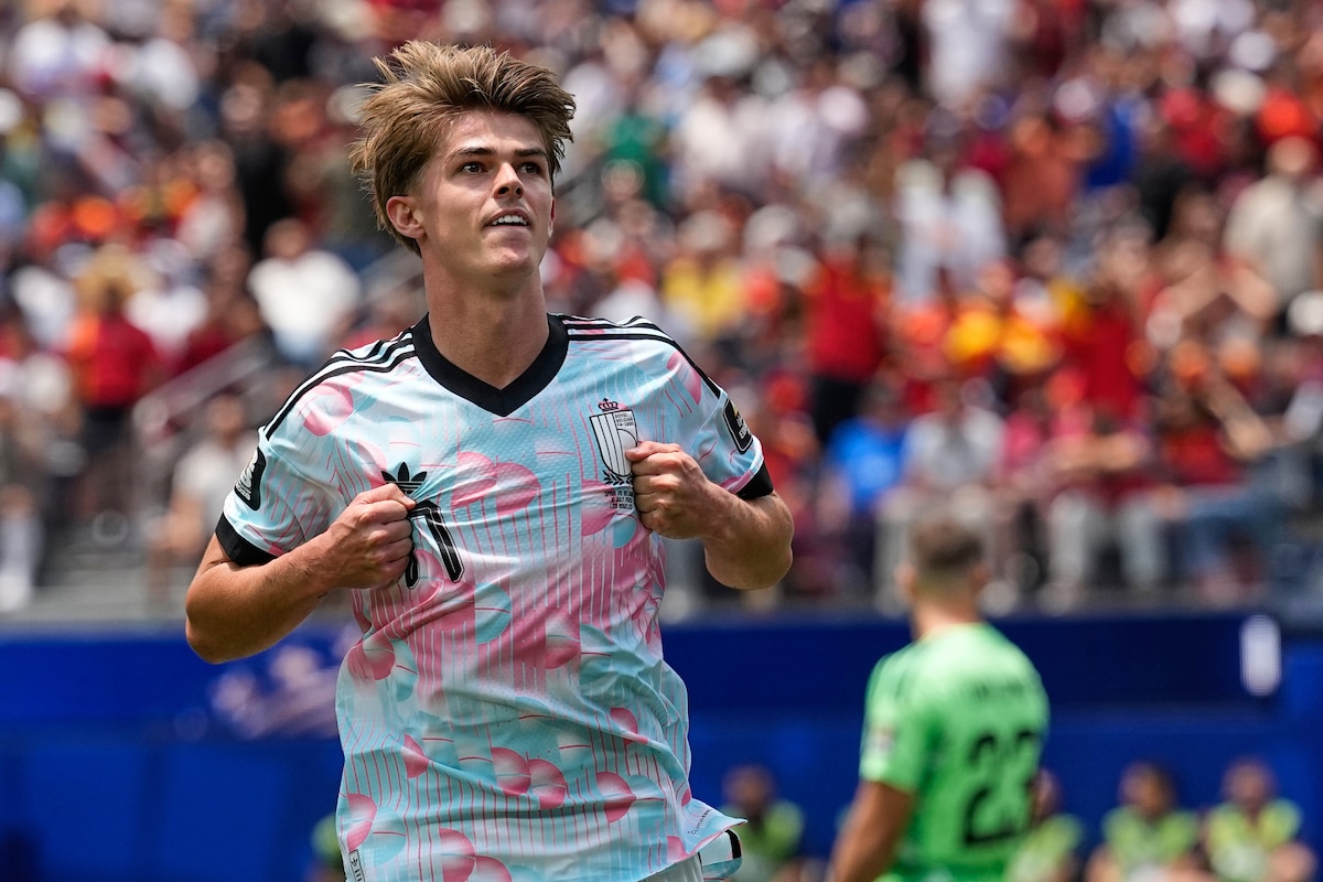 Belgium's Charles De Ketelaere (17) celebrates scoring their first goal during the World Cup quarterfinal soccer match between Spain and Belgium in Inglewood, Calif., near Los Angeles, Friday, July 10, 2026. (AP Photo/Gregory Bull)