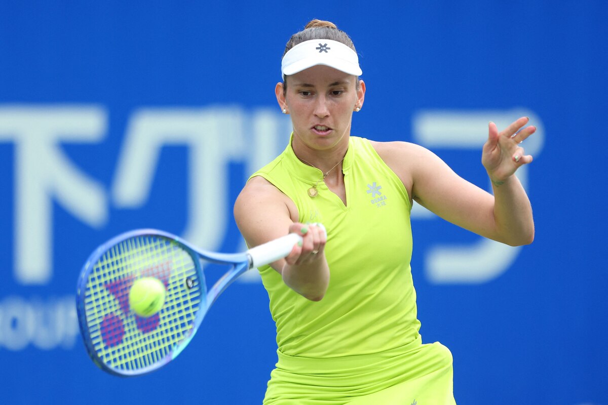 Belgium's Elise Mertens hits a return against Czech Republic's Tereza Valentova during their women's singles match at the Japan Open tennis tournament in Osaka on October 16, 2025. (Photo by PAUL MILLER / AFP)