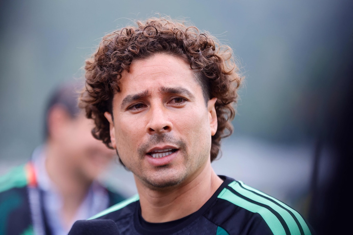 (FILES) Mexico's goalkeeper #13 Guillermo Ochoa speaks with the press ahead of a training session at the Centro de Alto Rendimiento (CAR) in Mexico City on July 4, 2026, on the eve of the 2026 World Cup round of 16 football match between Mexico and England. Mexican international goalkeeper Guillermo Ochoa announced his retirement from professional football on July 21, 2026 after a 22-year career during which he played in six FIFA World Cups, including this year's tournament. (Photo by Rodrigo Oropeza / AFP)