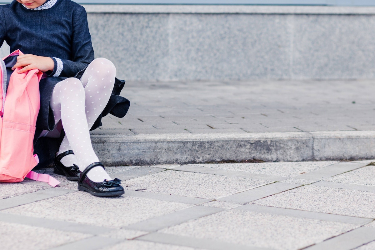 A,Girl,In,A,Blue,School,Dress,,White,Tights,And
