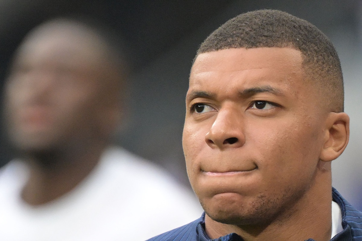 (FILES) France's forward Kylian Mbappe looks on as he warms up prior to the UEFA Euro 2024 group B qualification football match between France and Greece at the Stade de France in Saint-Denis, in the northern outskirts of Paris, on June 19, 2023. "I feel bad for my France" Mbappe said on his Twitter account on June 28, 2023, a day after a 17 year old boy was killed by a French policeman's gunshot, following a refusal to comply. (Photo by Alain JOCARD / AFP)